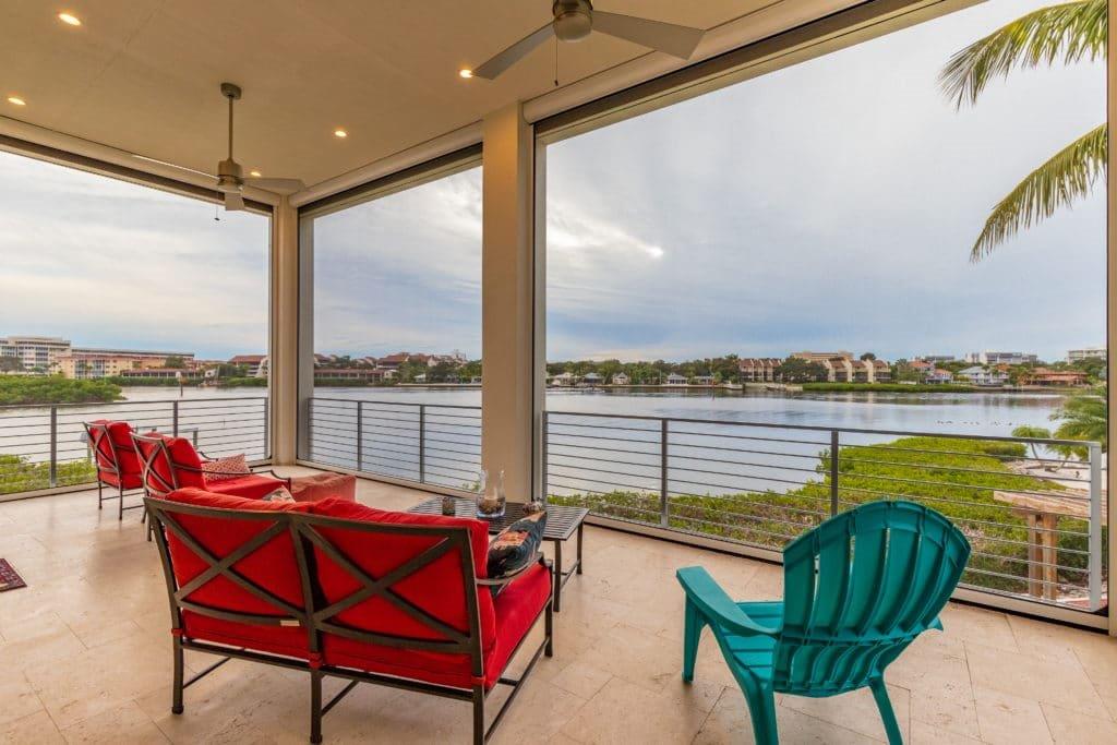 Retractable balcony motorized blinds and shades.